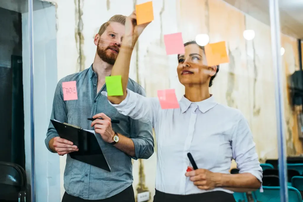 people engaged in a product development brainstorming session