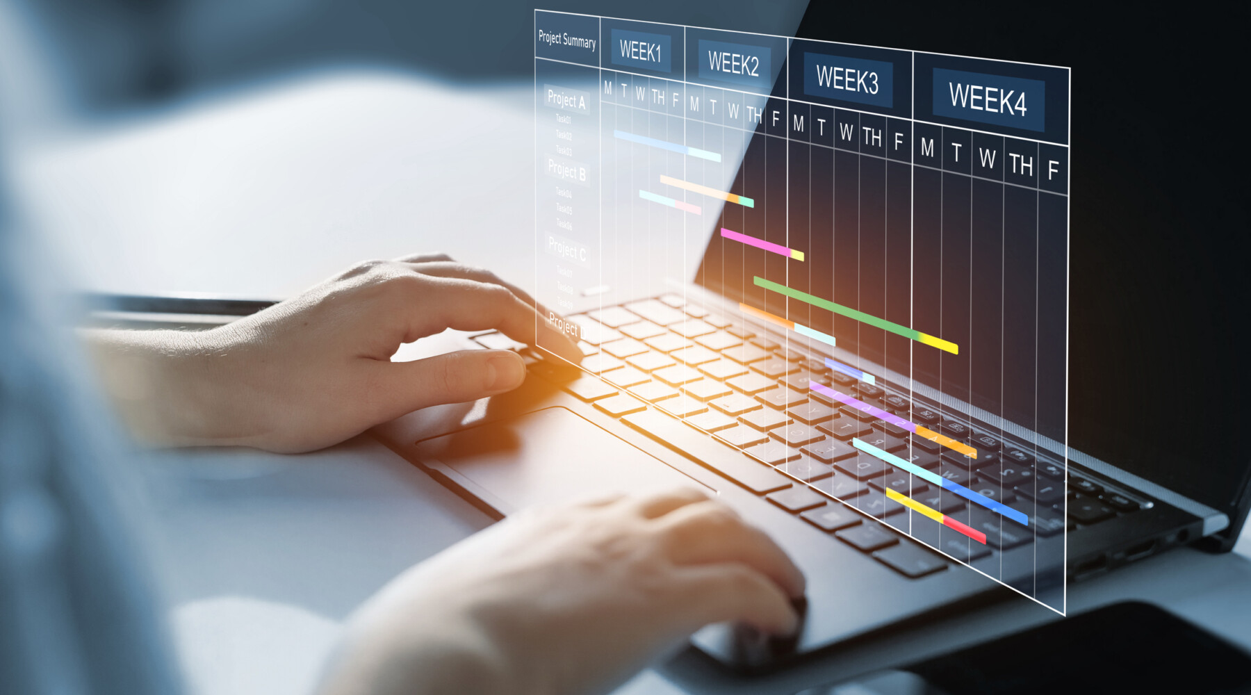 Project manager working on laptop and updating tasks and milestones progress planning with Gantt chart scheduling interface for company on virtual screen. Business Project Management System
